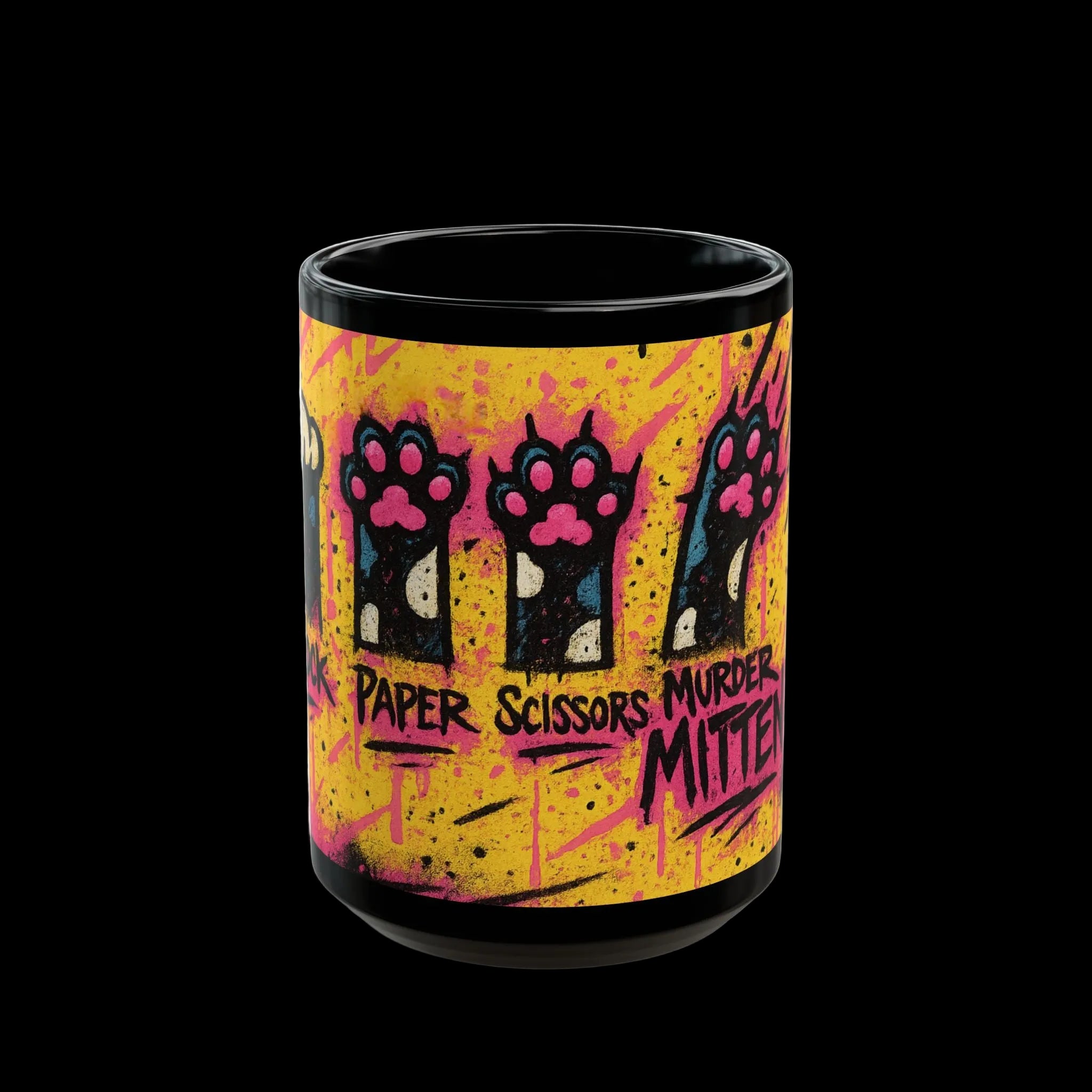 A black ceramic mug featuring a vibrant graphic design with three stylized black paw prints on a yellow and pink background, with the text 'PAPER SCISSORS MURDER MITTEN' printed on the front.