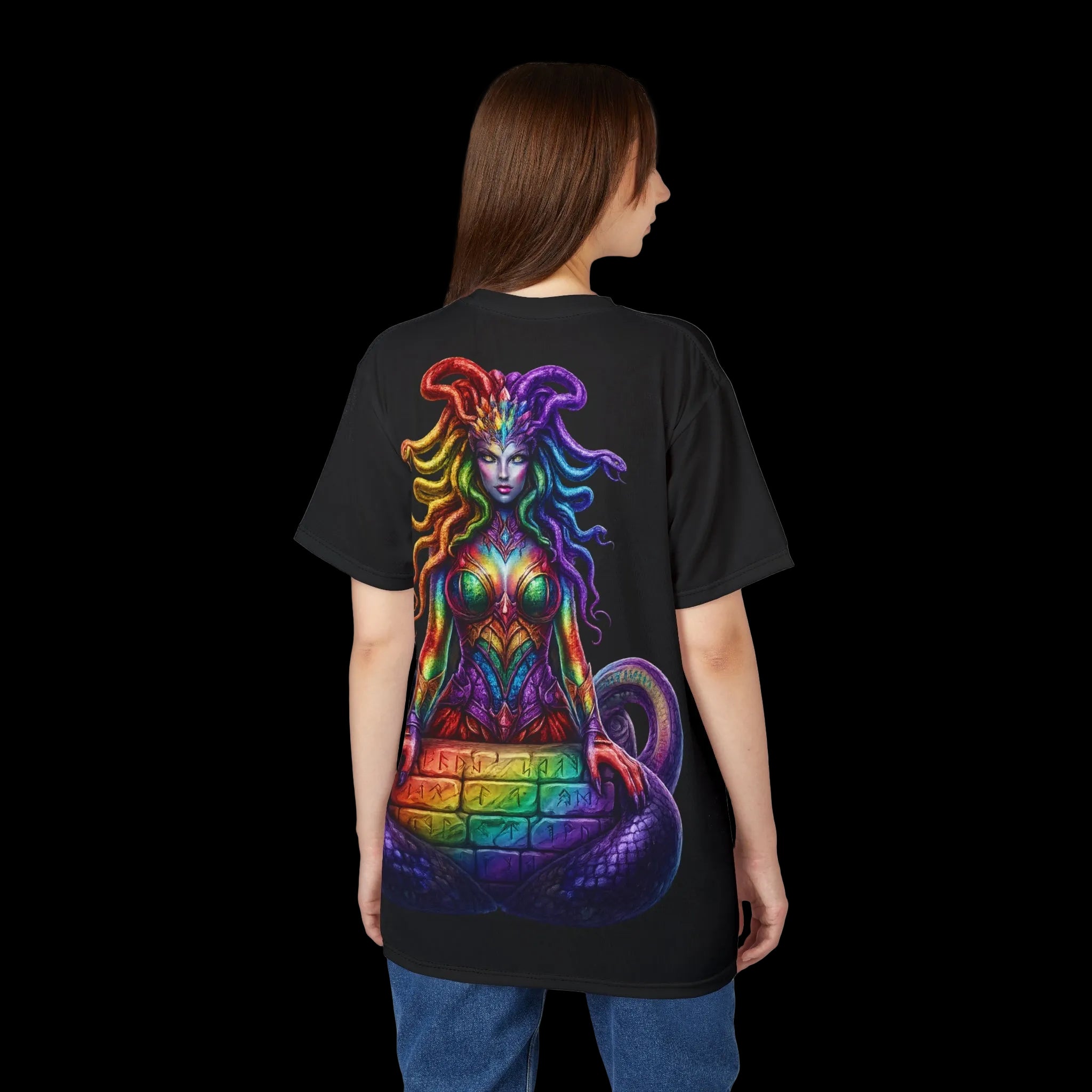 Black CKE Rainbow Pride Medusa T-Shirt featuring a vibrant graphic of Medusa with a rainbow mane against rune-inspired stonework.