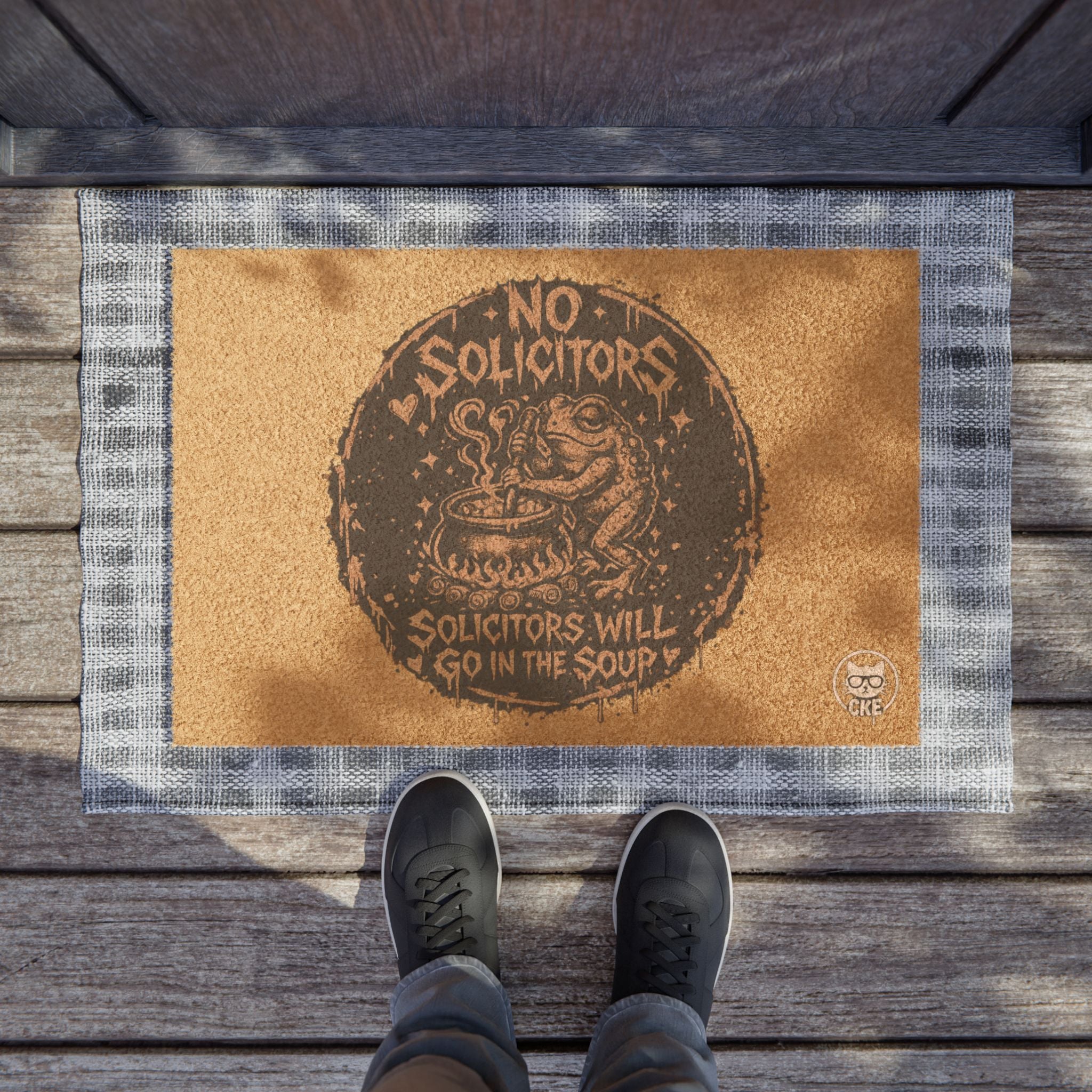 Gothic No Solicitors doormat with black and white chaos kitten design, perfect for gothic home decor.