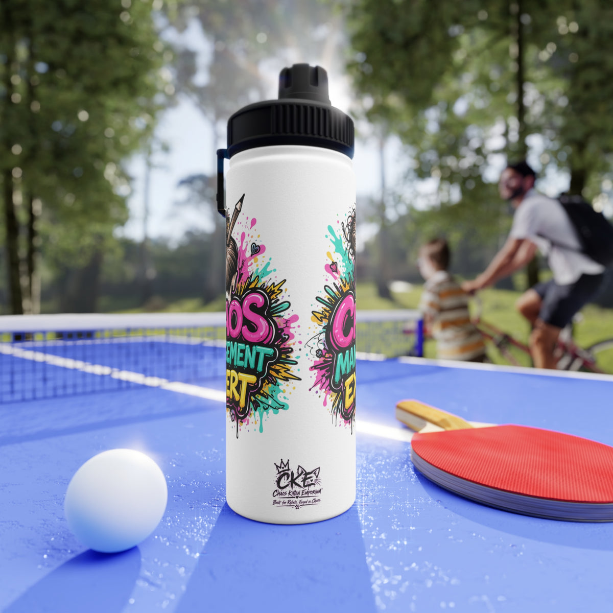a water bottle and paddle on a table