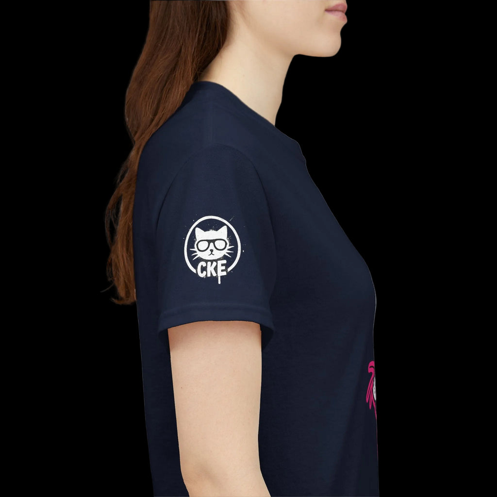 Navy blue t-shirt with a Chaos Kitten Emporium 'CKE' logo on the sleeve worn by a person