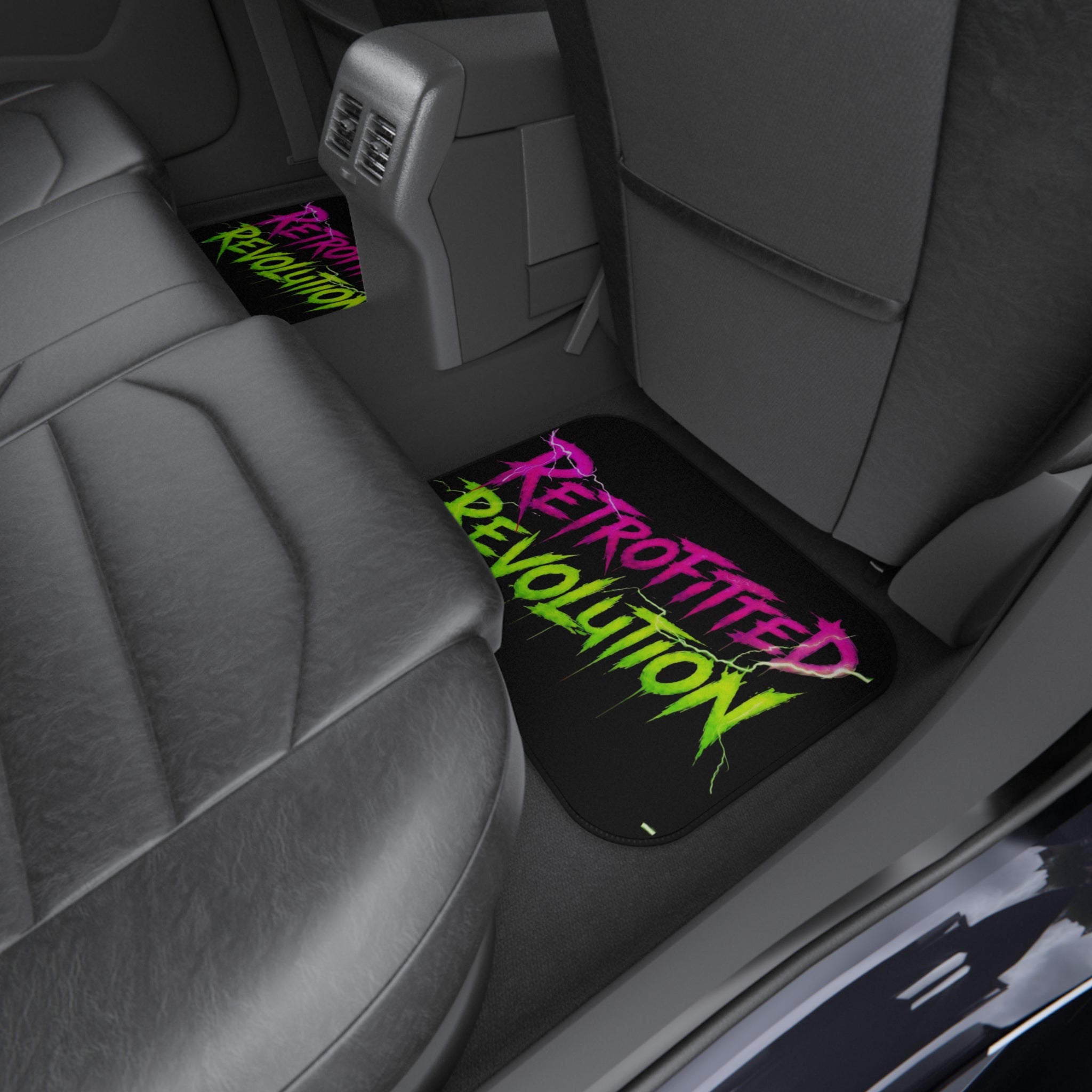 Set of four vibrant car mats featuring graffiti-style "Retrofitted Revolution" text and a bold steampunk design.