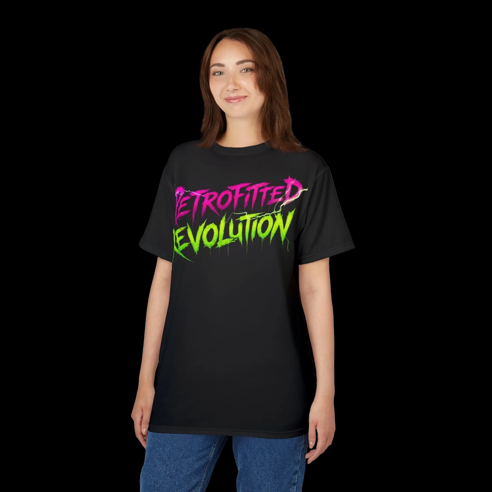 The vibrant Retrofitted Revolution T-shirt features bold pink and green text on a dark background, showcasing a steampunk design.