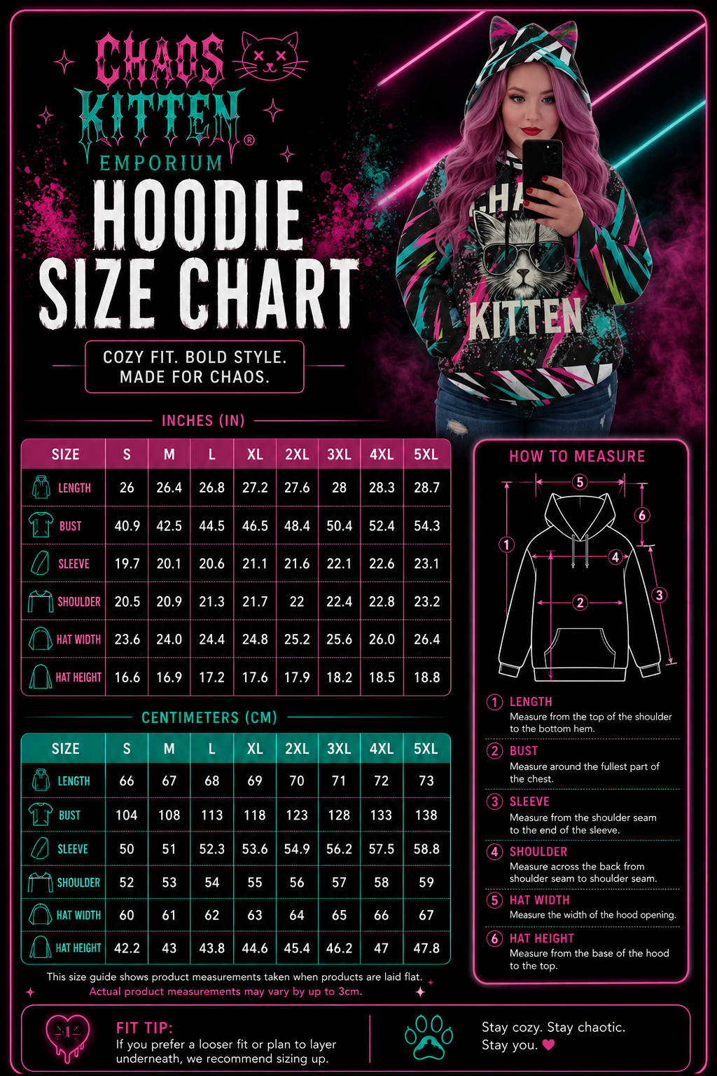 A woman playfully poses in a vibrant all-over print hoodie with decorative cat ears from Chaos Kitten Emporium®.