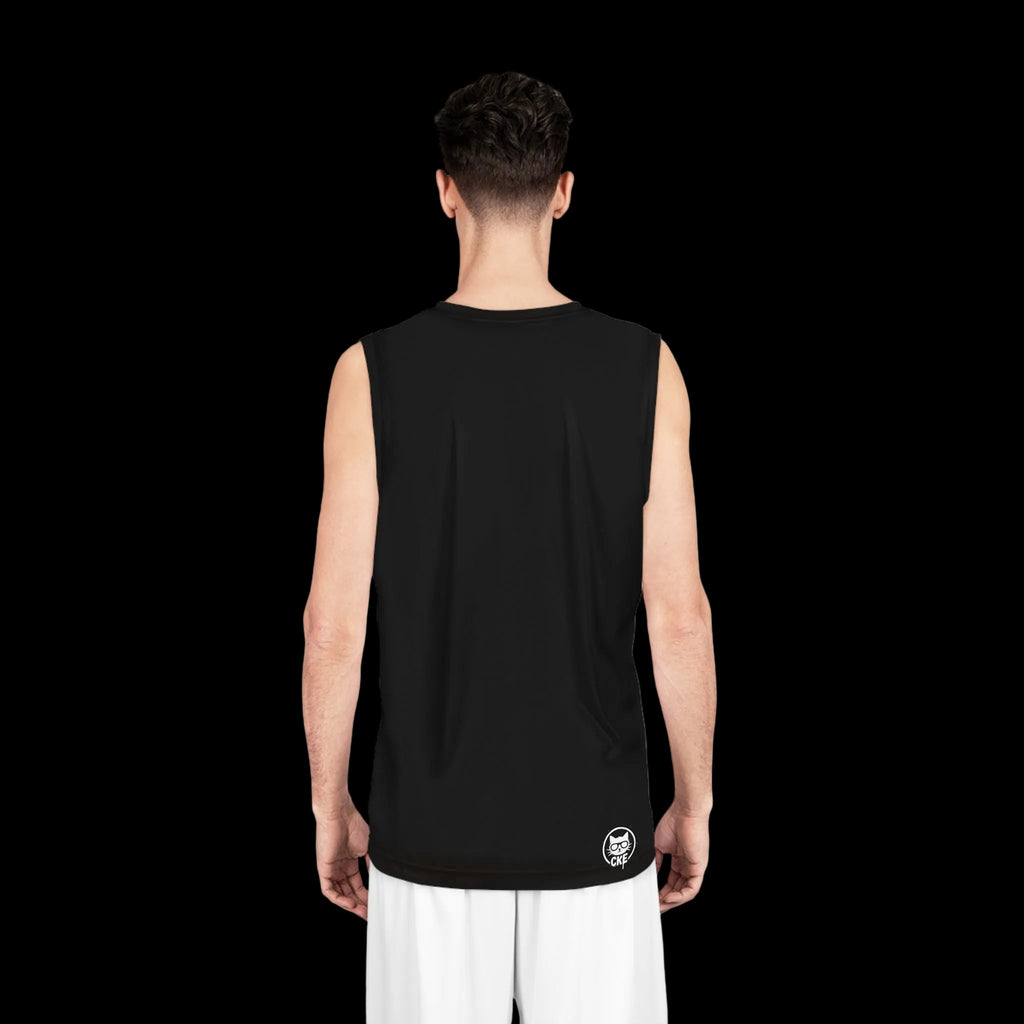 Person wearing a black sleeveless shirt with a Chaos Kitten Emporium logo on the back.